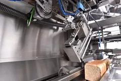 Bread wrapping machine with smart plastics
