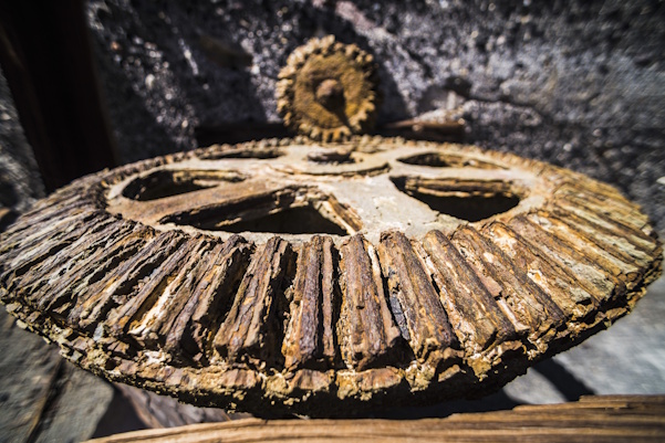 Rusted and damaged industrial bevel gear train