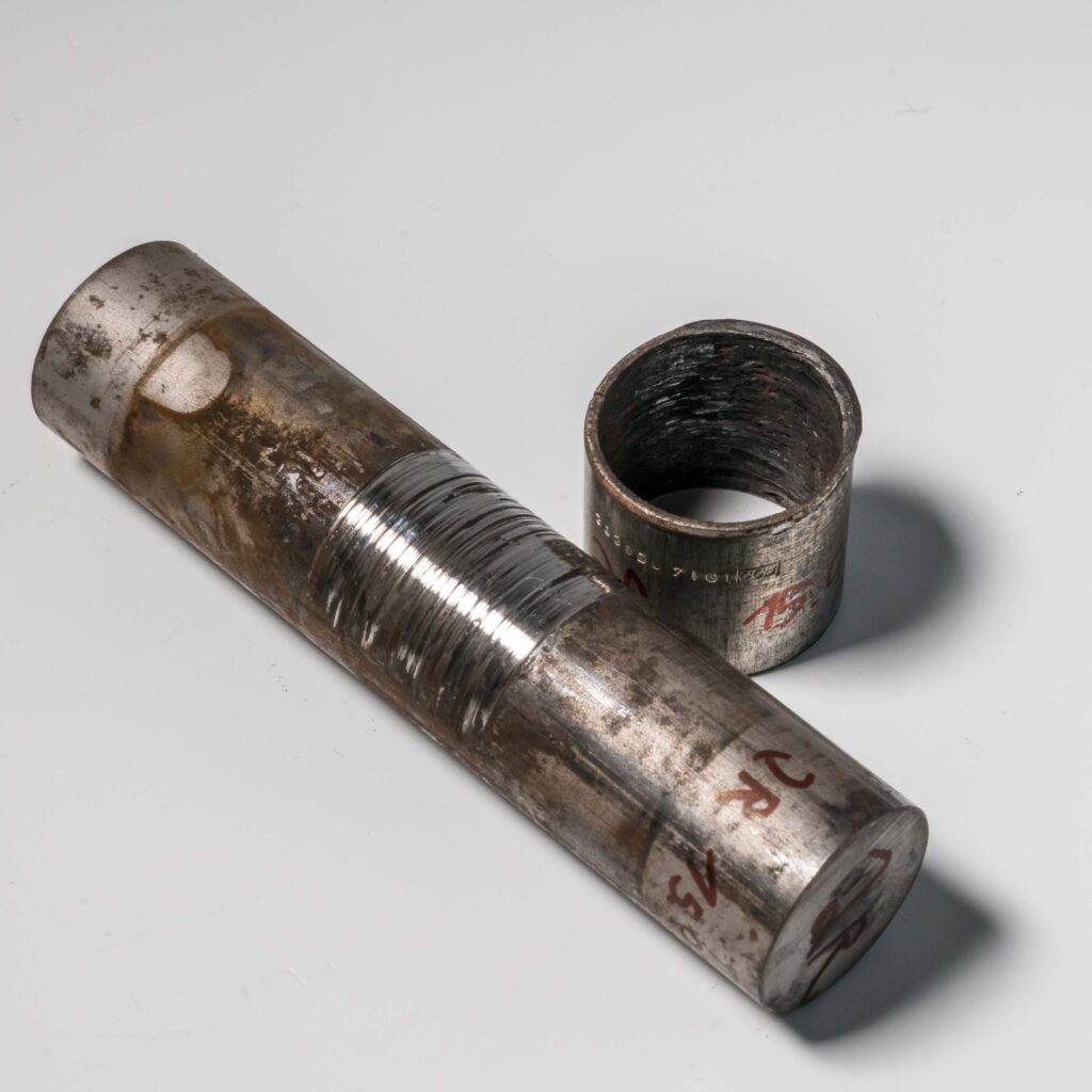 Shafting and iglide Q bearing with Teflon after use